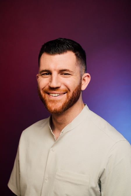 0576e645-c07f-4972-bc81-5d06f04177cc-headshot-Devin-Headshot-New